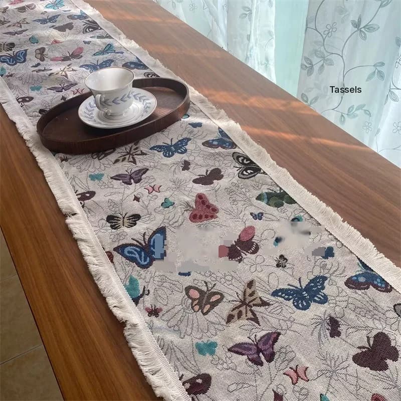 Amerikkalainen maalaistyylinen puuvilla-pellavapöytäliina, kukkakuvio ja tupsut